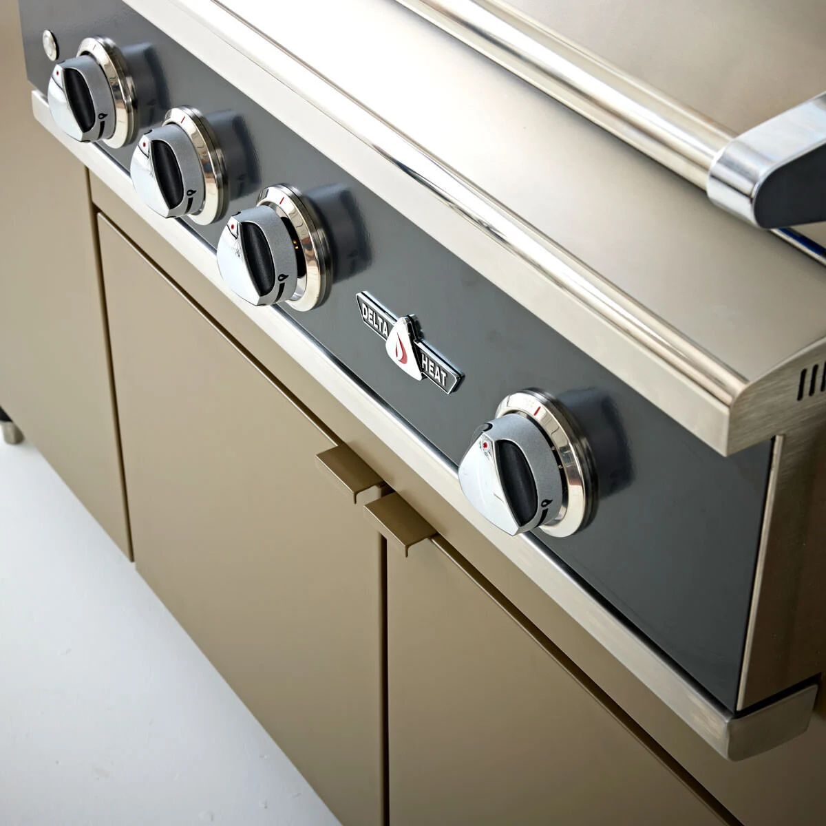 Custom outdoor kitchen burner and grill detail showing premium stainless steel finish. Shop near Spokane and Post Falls.