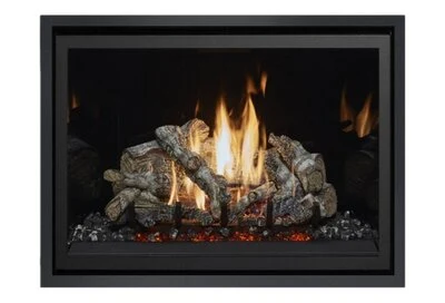 Close view of the 864 TV 40K Clean Face Deluxe gas fireplace with tall flames over a detailed log set.