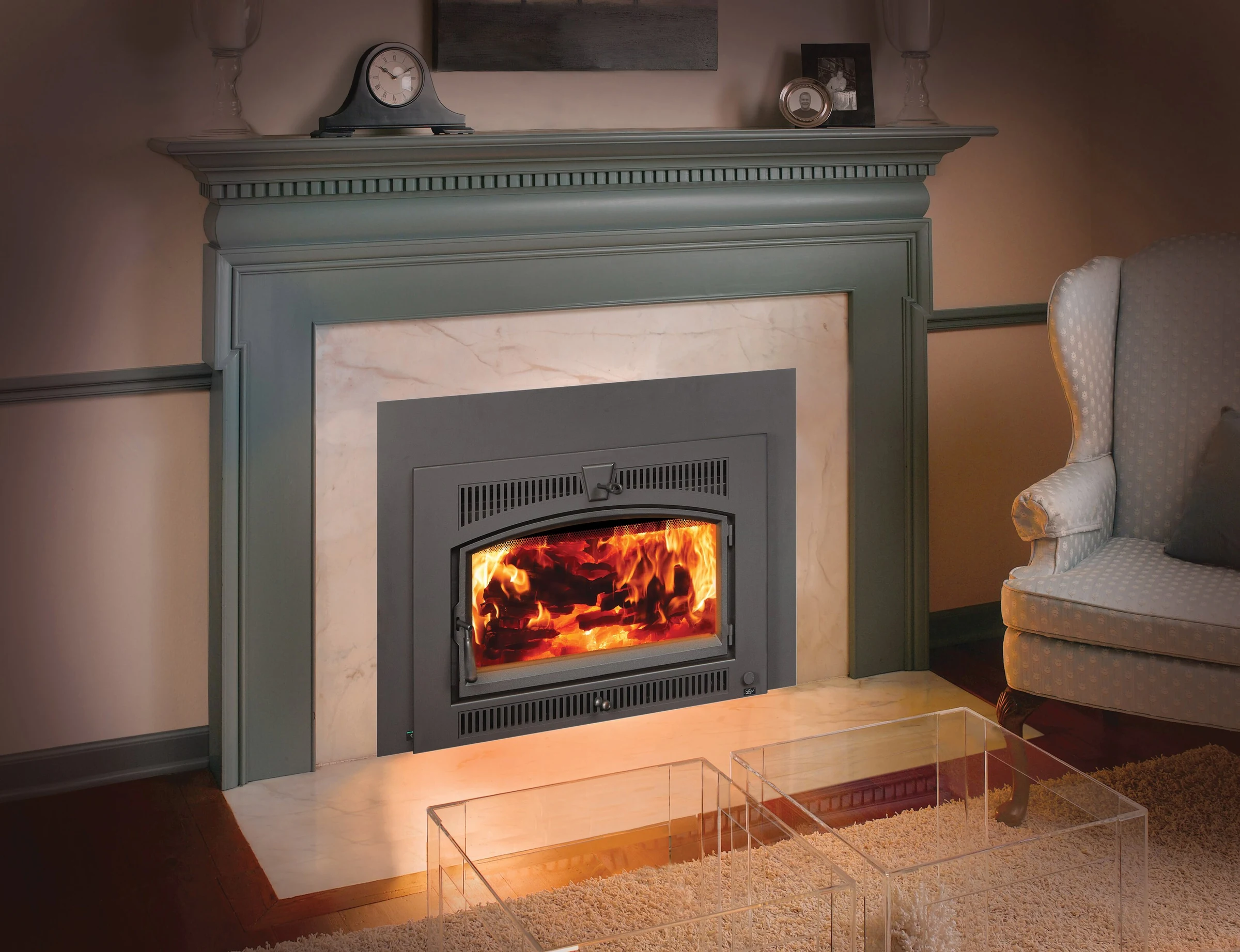 Fireplace Xtrordinair Large Flush NexGen-Hybrid wood insert installed in a painted wood fireplace surround.