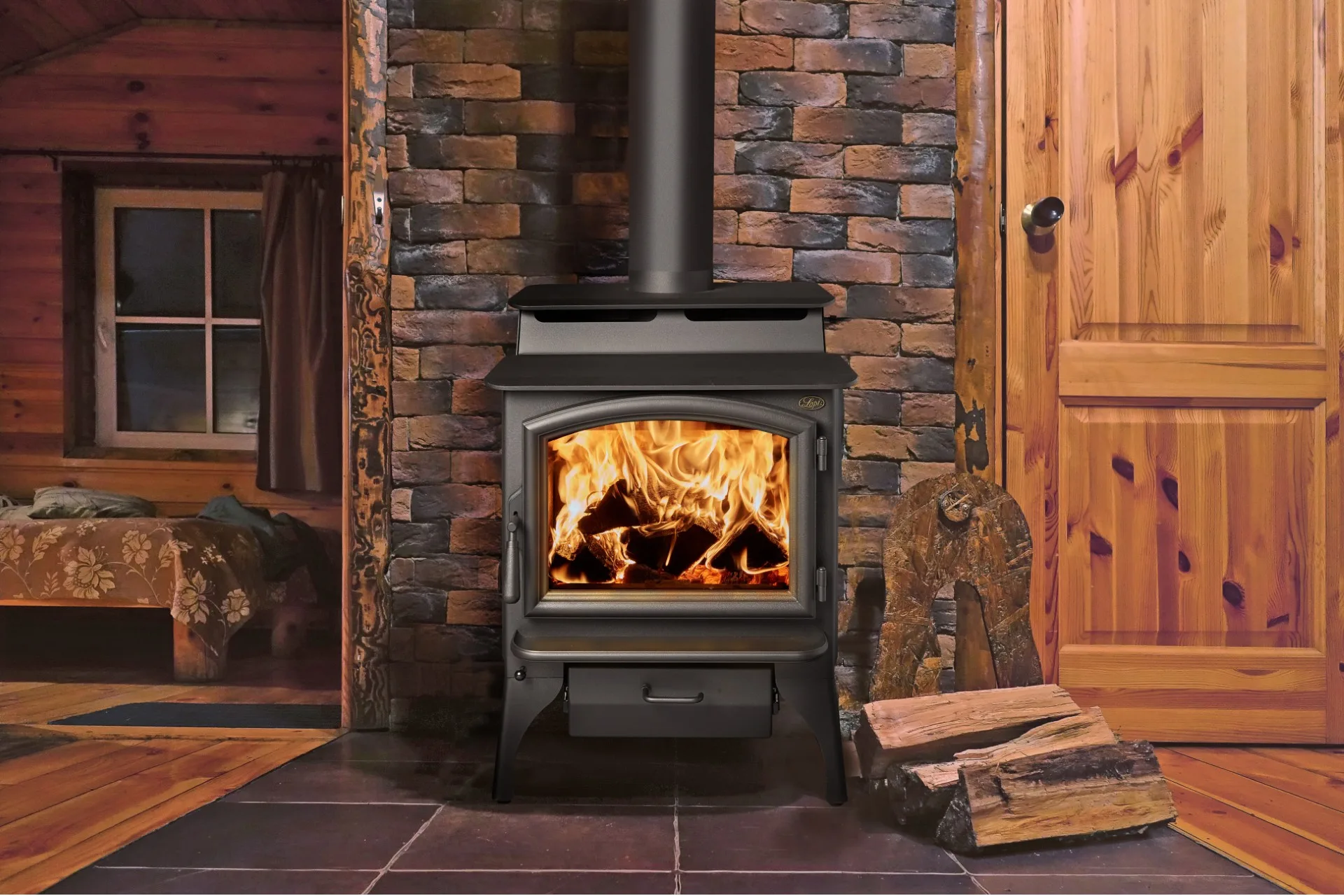 Lopi wood stove burning in a cabin with stone accent wall
