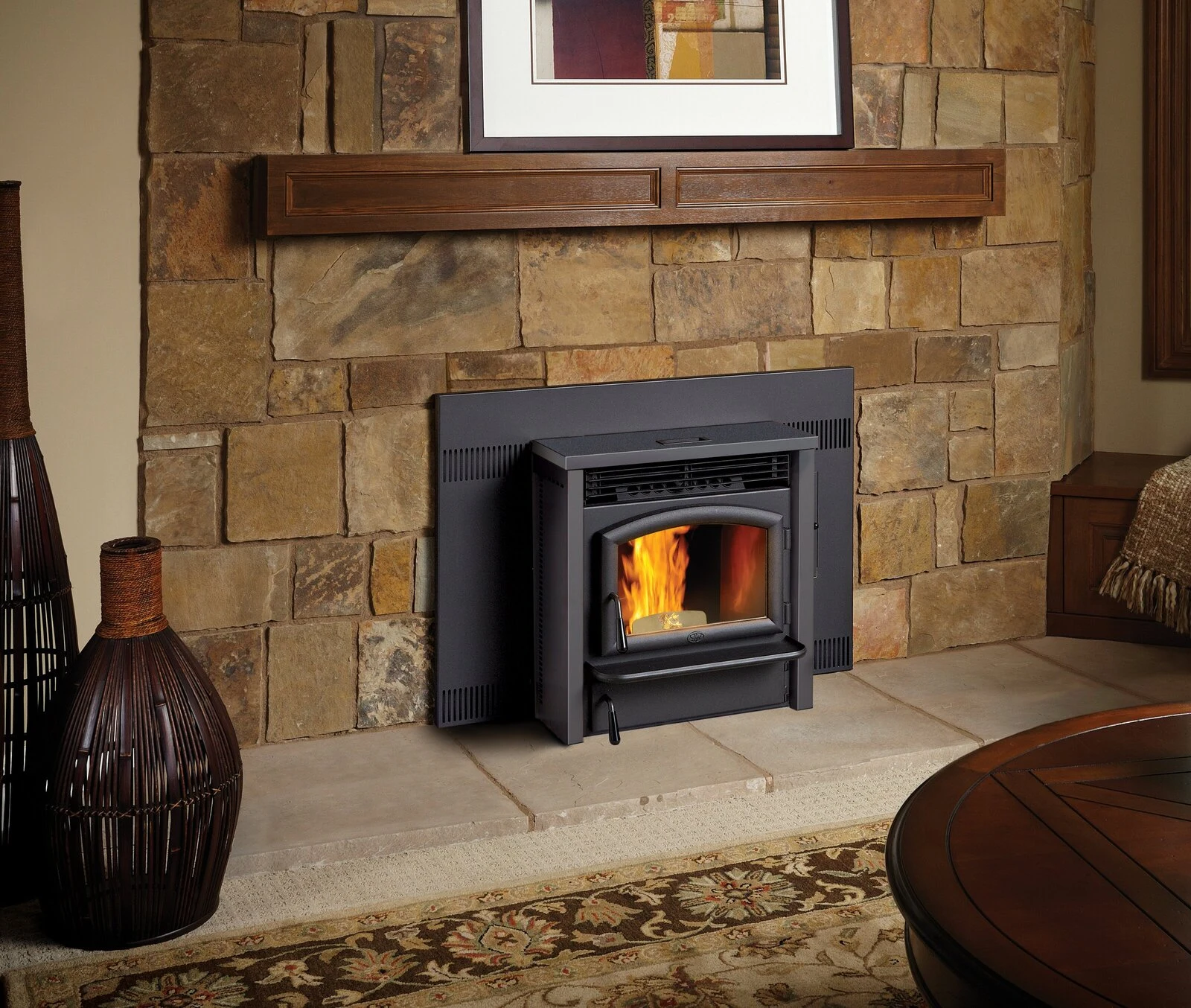 Pellet fireplace insert in a stone wall