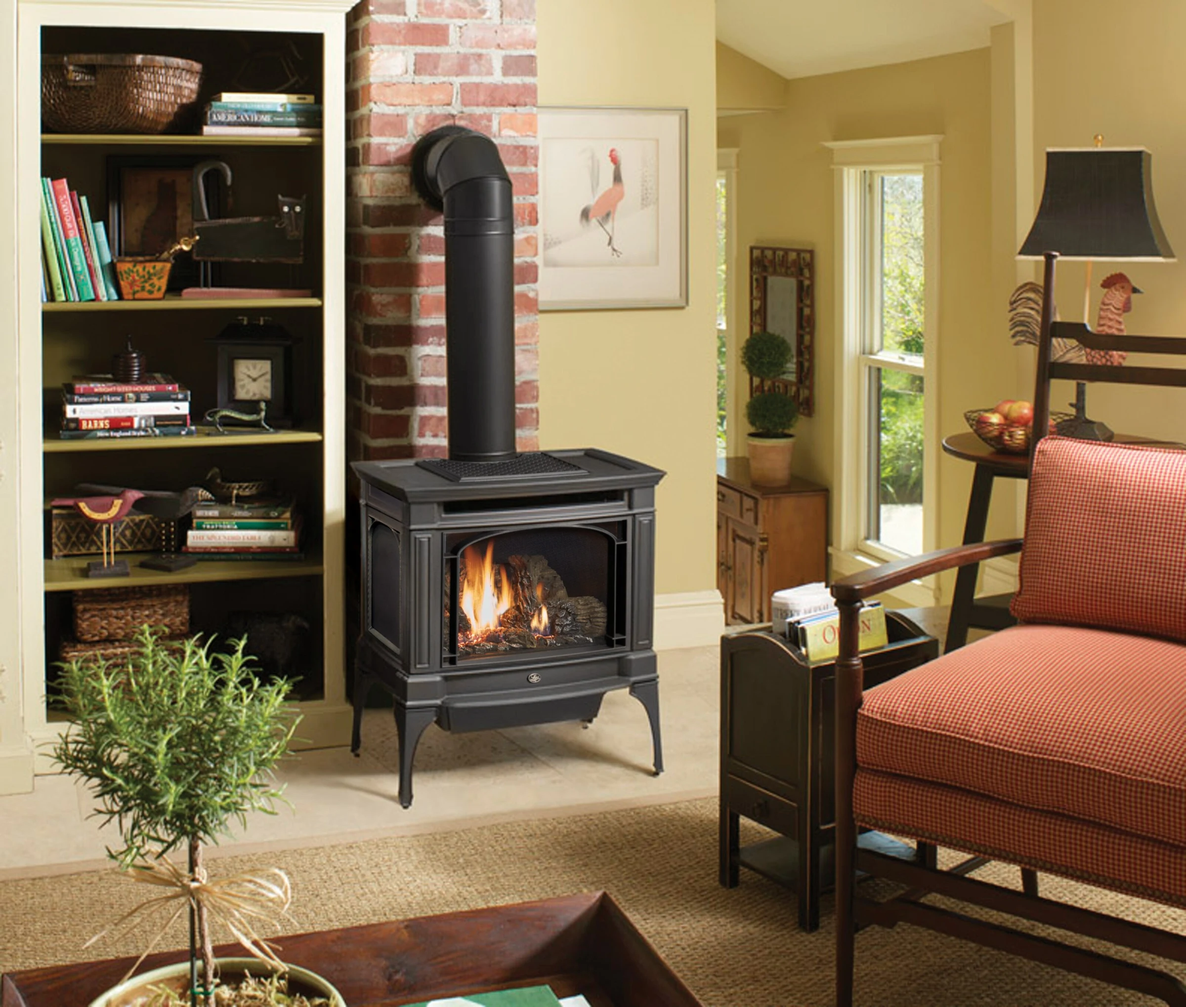 Lopi Berkshire Millivolt Gas Stove in a cozy living room with built-in bookshelves, warm lighting, and an armchair nearby.