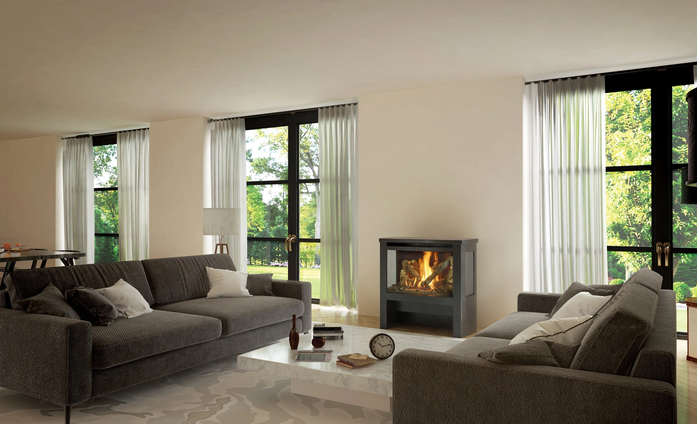 Lopi Cypress Bay Window Gas Stove in a bright modern living room with large windows, a gray sofa, and minimalist decor.