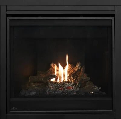Napoleon Ascent BX 36 gas fireplace burning with a split oak log set and ember bed.