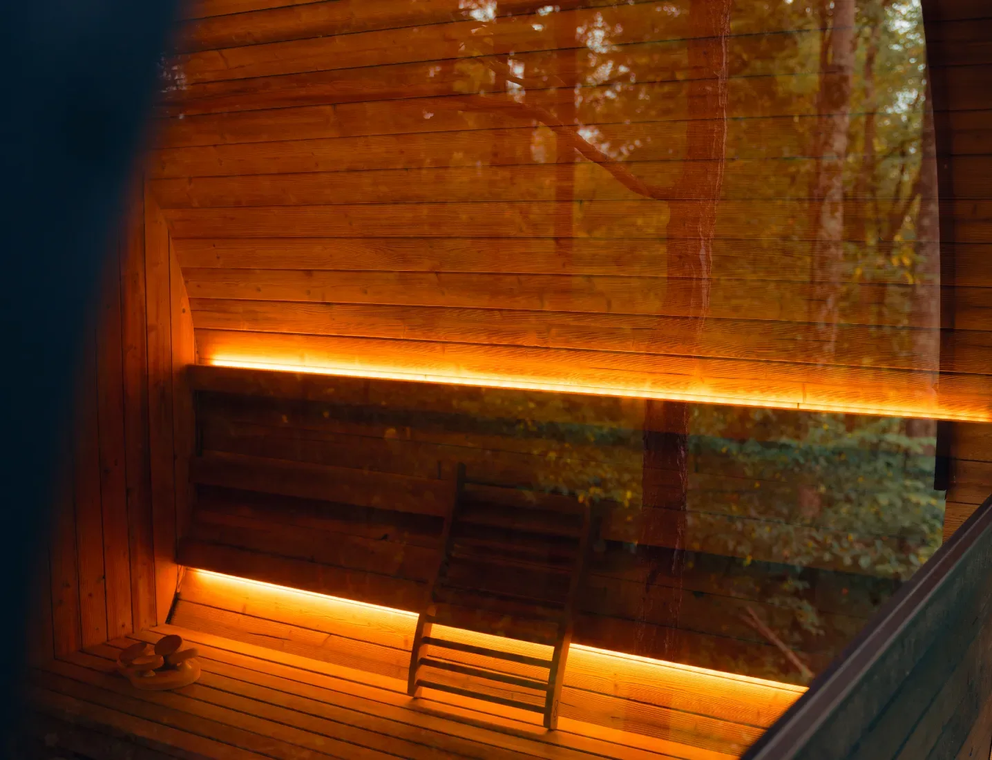 Thermory Ignite Barrel Sauna interior with warm bench lighting
