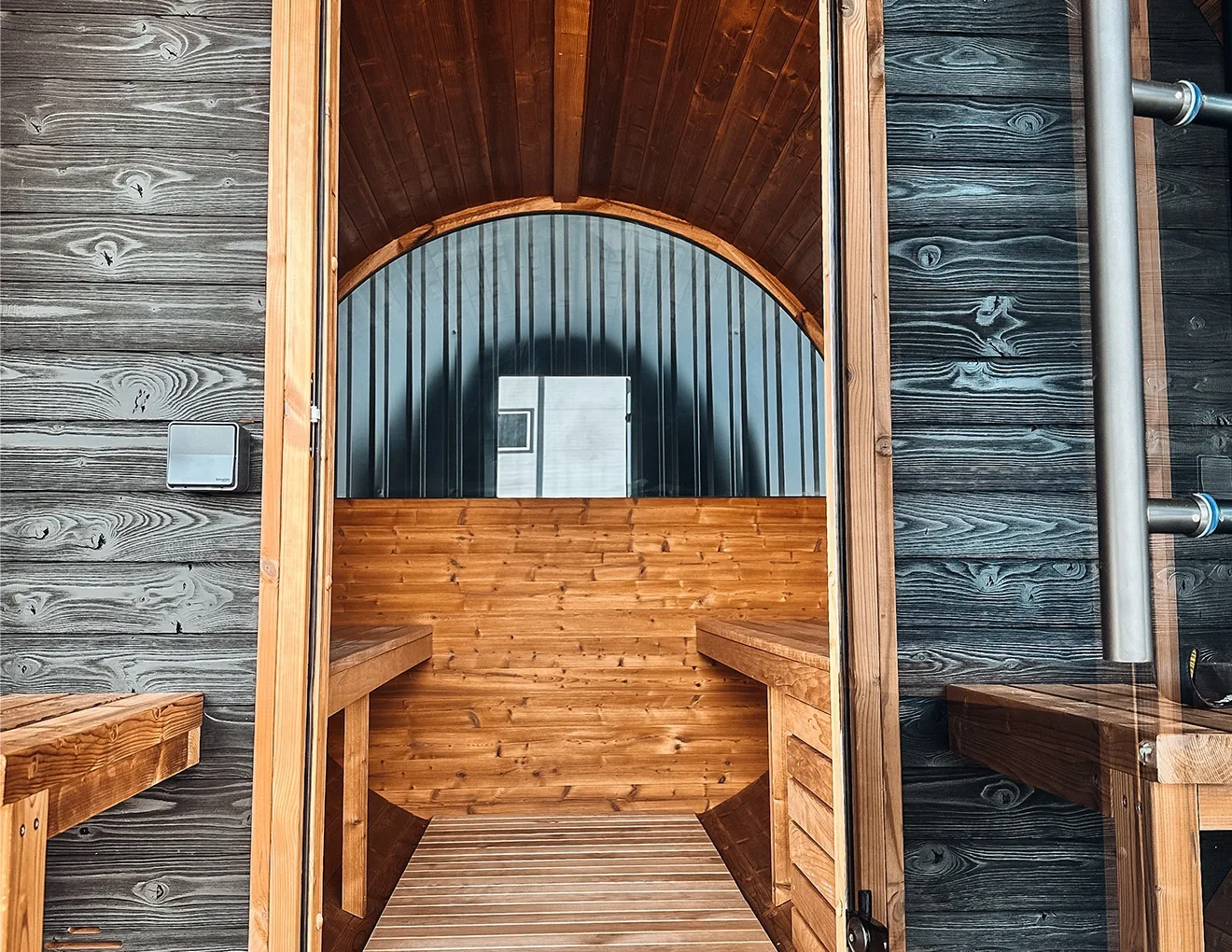Thermory Ignite Barrel Sauna interior looking out through the door