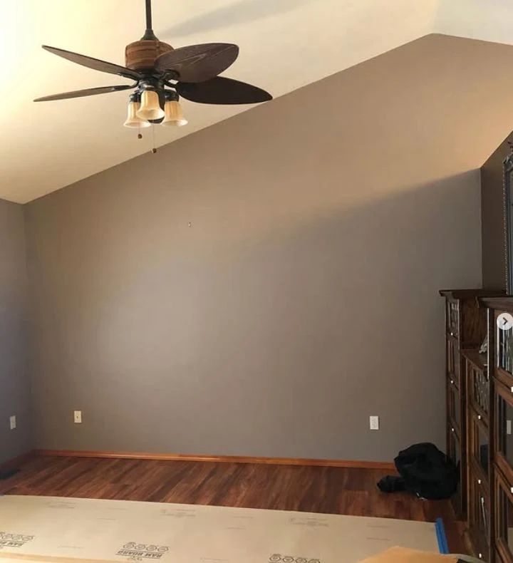 Blank living room wall before custom fireplace installation in a North Idaho home