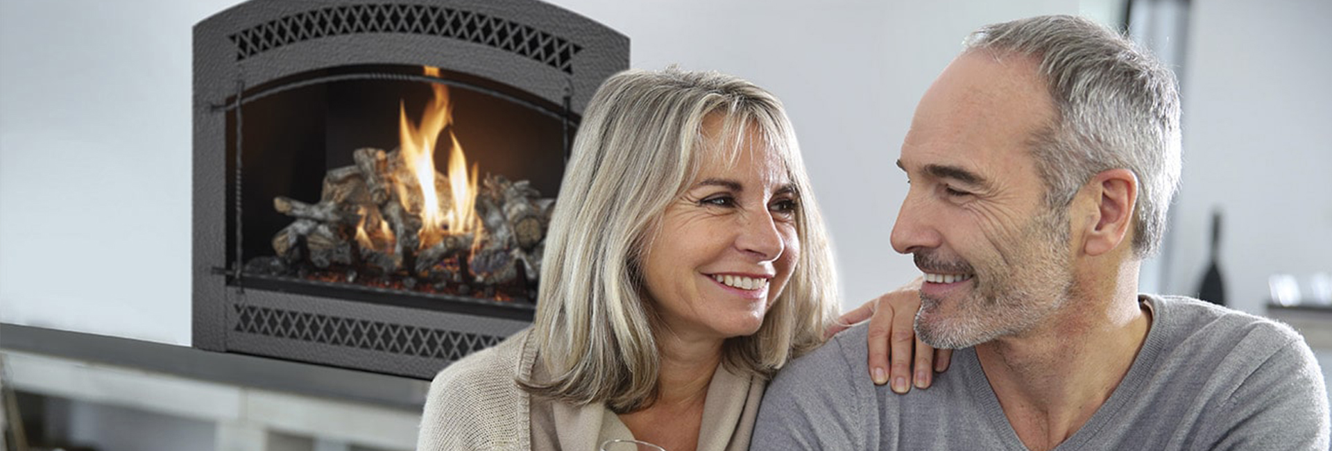 A couple enjoying their fireplace