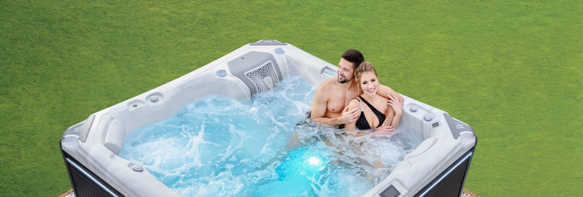 A couple relaxing in their hot tub